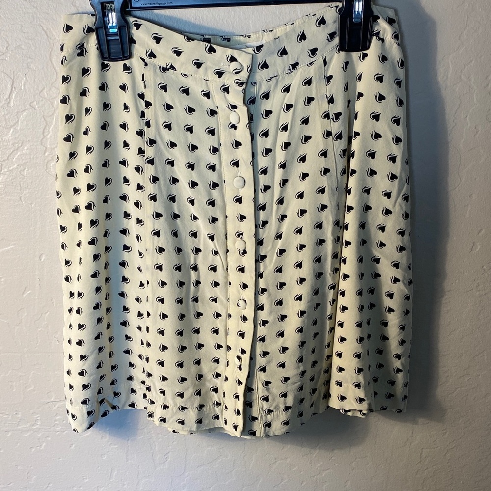 For love and lemons black heart skirt with buttons down the front.